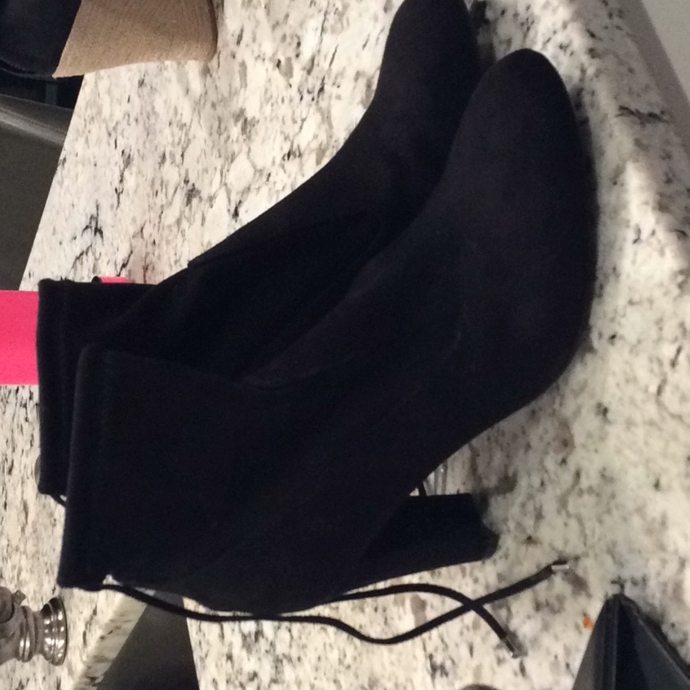 Black high heeled boots